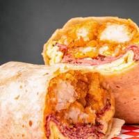 Breakfast Burrito With Choice Of Meat · Flour tortilla filled with scrambled eggs, tater tots, cheddar cheese and your choice of mea...