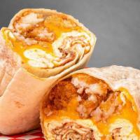 Classic Breakfast Burrito · Flour tortilla filled with scrambled eggs, tater tots and cheddar cheese!.