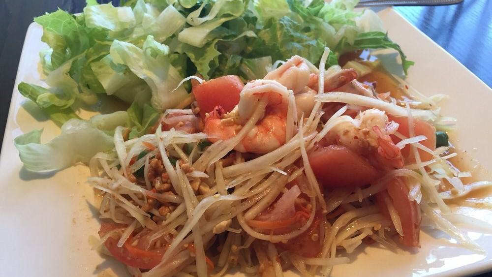 Green Shredded Papaya With Shrimp · Shredded green papaya, mint leaves, topped with roasted peanuts. Served with Vietnamese vinaigrette sauce on the side.