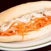 Grilled Pork Sandwich · Grilled pork with mayo, butter, cucumber, julienne carrots and daikon radish, and cilantro, ...