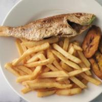 Escovitch Fish · Fried fish in a vinegar sauce with mixed vegetables.