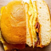 Classic Breakfast Sandwich · 2 Fried, Scrambled, or Egg Whites on a Hard Roll, Bagel, or English Muffin with your choice ...