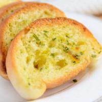 Garlic Bread · Toasted bread topped with garlic and olive oil.