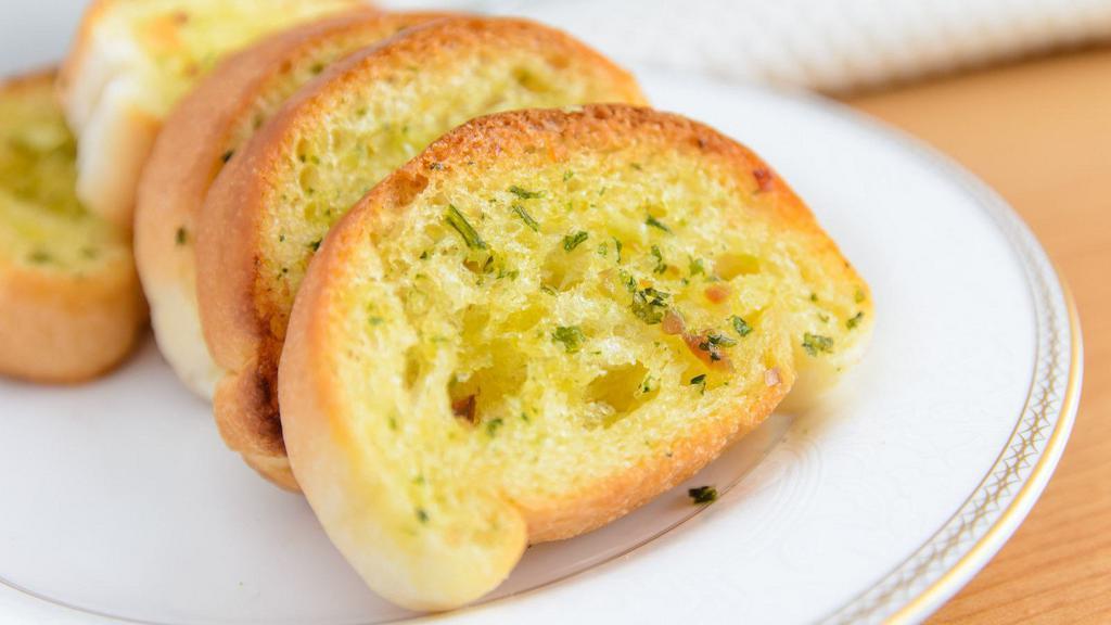 Garlic Bread · Toasted bread topped with garlic and olive oil.