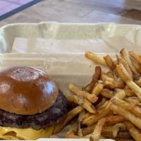 The Kids Meal · A grass fed cheeseburger on a brioche bun with a side of fries.