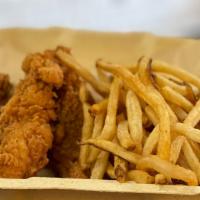 Kids Chicken Tenders · Three pieces of organic chicken breast hand battered and fried with a side of hand cut fries.