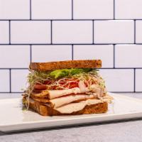Turkey Sandwich · Turkey breast, tomato, sprouts, avocado, mayo and whole grain mustard on a toasted 7-grain b...