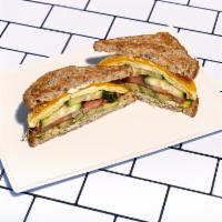 The Veggie Sandwich · Egg, avocado, sprouts, cucumber, cheddar, tomato, pickled red onion, wasabi mayo on toasted ...
