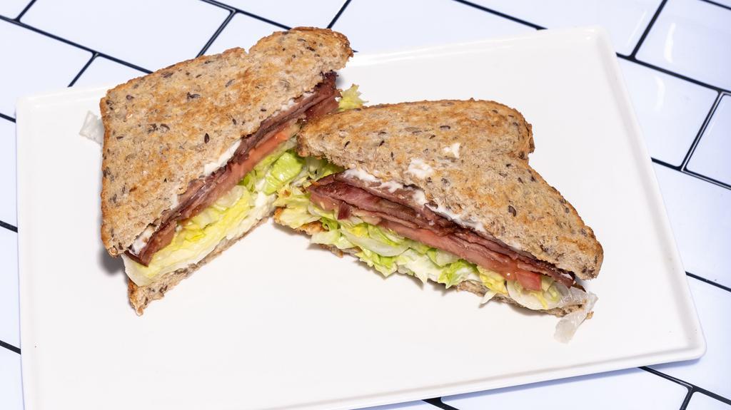 Blt Sandwich · Applewood smoked turkey bacon, lettuce, tomato, mayo on a toasted 7-grain bread.