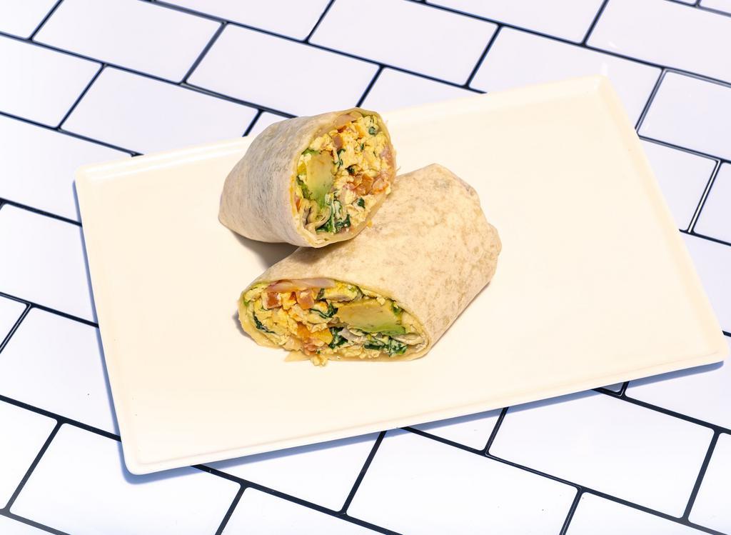 Breakfast Burrito · 3 eggs scrambled, tomato, spinach, red onion, avocado, cheddar cheese, and sriracha in a flour tortilla.
