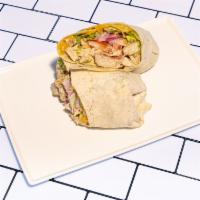 Grilled Chicken Wrap · Grilled chicken, avocado, lettuce, cheddar, tomato, pickled red onions and chipotle cream on...