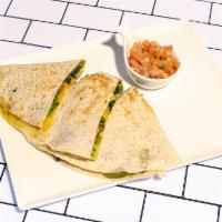Farmers’ Market Quesadilla · Grilled tomatoes, mushrooms, poblanos, bell peppers, onions, spinach; avocado, cheddar in a ...
