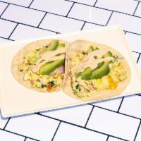 Breakfast Tacos · 2 tacos per order. Scrambled eggs, spinach, tomato, pickled red onions, cheddar, avocado, an...
