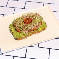 Avocado Toast · Mashed avocado, grape tomatoes, red pepper flakes and alfalfa sprouts served on a toasted mu...