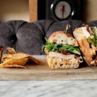 Roasted Chicken Sandwich · Roasted chicken, chili mayonnaise, pickled onions, arugula, sliced avocado on a French bague...