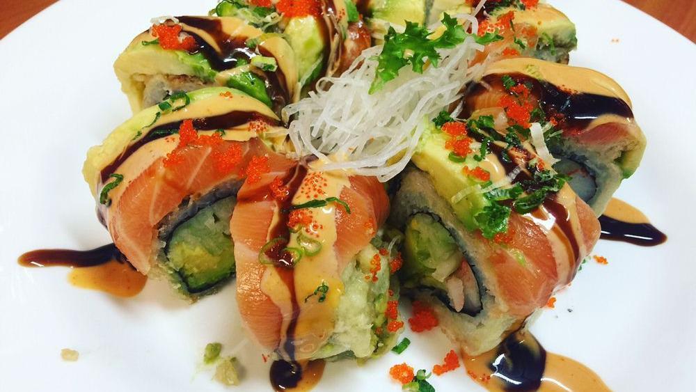 Hawaiian Roll · Spicy yellowtail and avocado inside. Topped with eel, tuna and avocado with house sauce, tobiko and scallion.