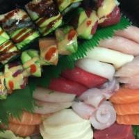 Chirashi Deluxe · A variety of raw fish over seasoned rice.