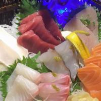 Sashimi Deluxe · 16 piece sashimi and one bowl rice.