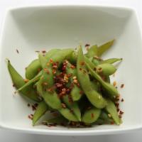 Edamame · Steamed edamame, tossed in a citrus and sesame vinaigrette