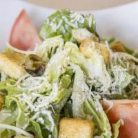 Caesar Salad · Mixed romaine lettuce with croutons and homemade caesar dressing.
