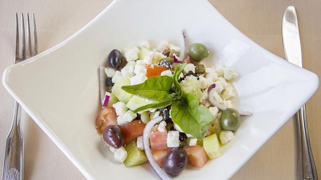 Greek Salad · Mixed vegetables with Greek feta cheese and Kalamata olives