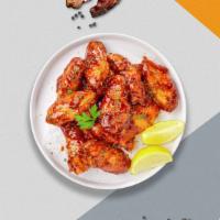 Chili Lime Time Wings · Fresh chicken wings breaded, fried until golden brown, and tossed in chili lime Sauce. Serve...