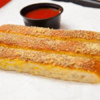 Breadsticks · Crispy on the outside, soft and chewy on the inside. Seasoned with garlic and parmesan and s...