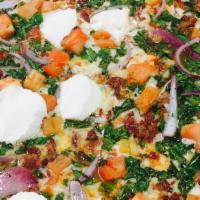 The Veggie Delight Pizza · Mozzarella and tomato sauce with mixed seasonal vegetables.