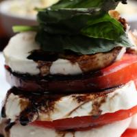 Caprese Salad · Fresh mozzarella, beefsteak tomatoes, balsamic reduction, garlic crema and fresh basil. Glut...