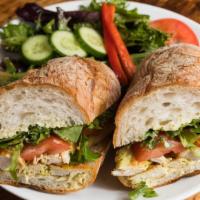 Grilled Chicken Sandwich  · Ciabatta bread, honey-mustard dressing, mixed greens, and tomato.