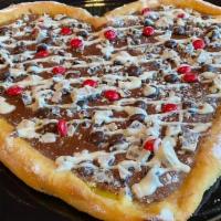 Heart Shaped Dessert Pizza · Get our dessert, heart shaped pizza for yourself or order one for your crush!