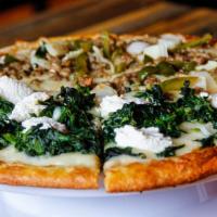 Keto Spinach And Ricotta Pizza Gluten-Free · Served on an almond flour crust.