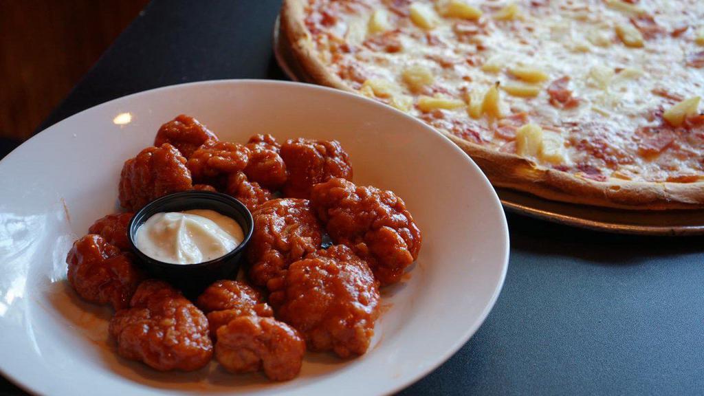 20 Boneless Wings · Served with 2 sides of blue cheese.