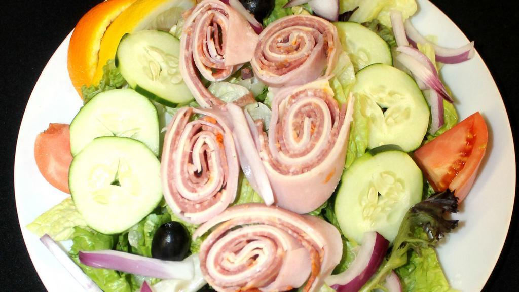 Julienne Salad · Romaine lettuce, tomato, cucumber, black olives, onions, ham, turkey & American cheese