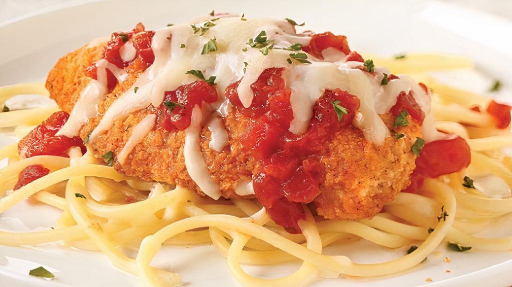 Chicken Parmesan With Ziti · Garlic knot included.