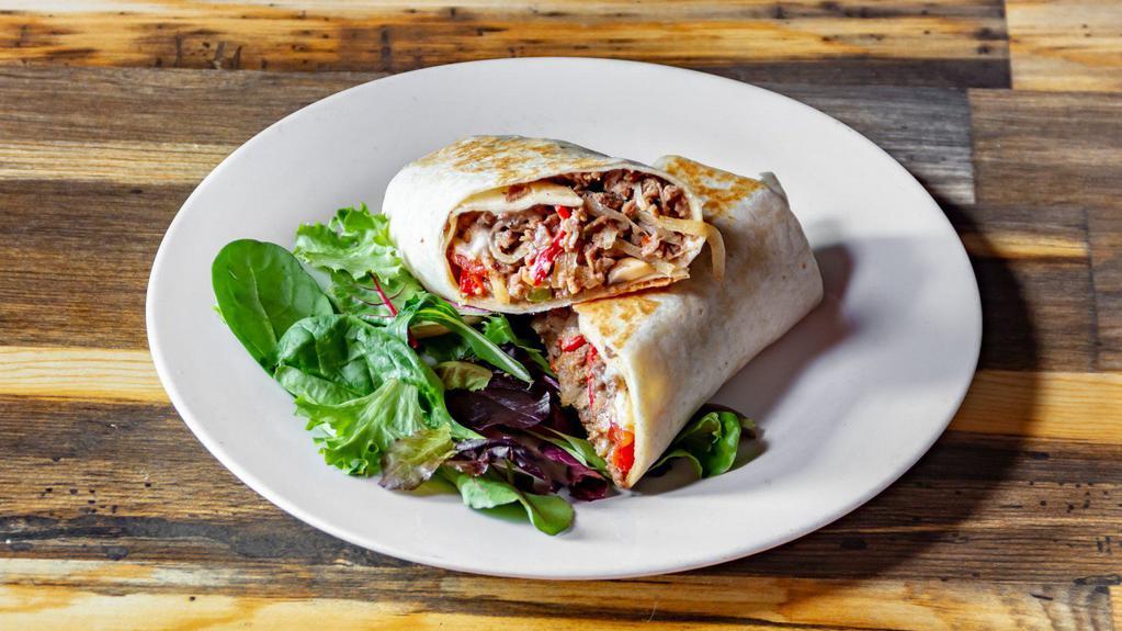 Philly Steak Wrap · Shaved steak, green peppers, onions, lettuce, tomato and American cheese.