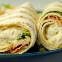 Buffalo Chicken Wrap · Fresh Wrap made with Grilled Buffalo chicken, bacon, Swiss, lettuce, tomatoes and blue chees...