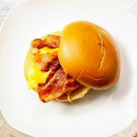 The Baconing Of Breakfast Sandwich · Scrambled egg, bacon, and cheddar cheese on your choice of bread.