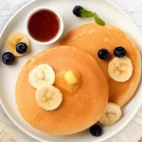 Going Bananas Berry Pancakes · Fluffy banana and berries pancakes cooked with care and love served with butter and maple sy...