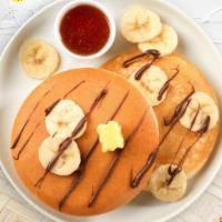 Nagging Banana Nutella Pancakes · Fluffy banana nutella pancakes cooked with care and love served with butter and maple syrup....