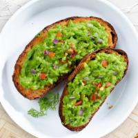 Get Toasted! · Freshly sliced avocado gently pressed against toast.