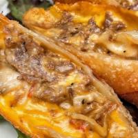 Philly Rolls · Thin Sliced Filet-Sautéed Onion- Cheddar - Chipotle