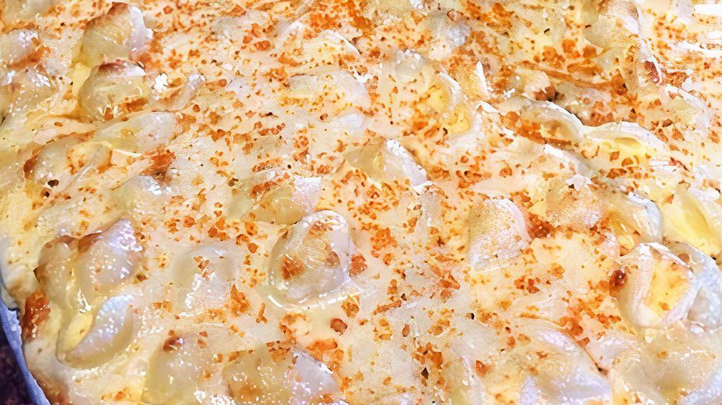 Truffle Mac & Cheese Pizza
 · 8 slices. Small shells, three cheese, seasoned breadcrumb, truffle.