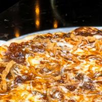 Barbecue Short Rib Pizza
 · 8 slices Pulled short rib, mozzarella, BBQ sauce, fried onions.
.