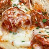 Meatball Parmigiana Hero · Served with French fries.