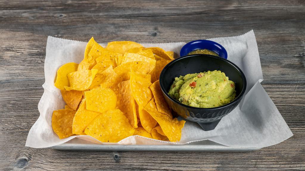 Guac And Chips · Served with chips. Add more items at an upcharge.