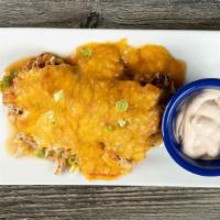 Stuffed Plantains · (3) pork, salsa rioja, blended cheese with chipoltle sour cream on side.