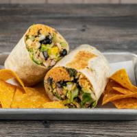 Caribbean Burrito · Blackened chicken, mango salsa, salsa verde and lettuce with your choice of Rice and Beans