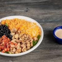 Buffalo Chicken Bowl · Chopped chicken, blended cheese, creamy hot sauce, pico and lettuce.