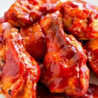 Buffalo Wings Single (10 Pieces) · 10 succulent Wings with Carrots, Celery and Blue Cheese or Ranch